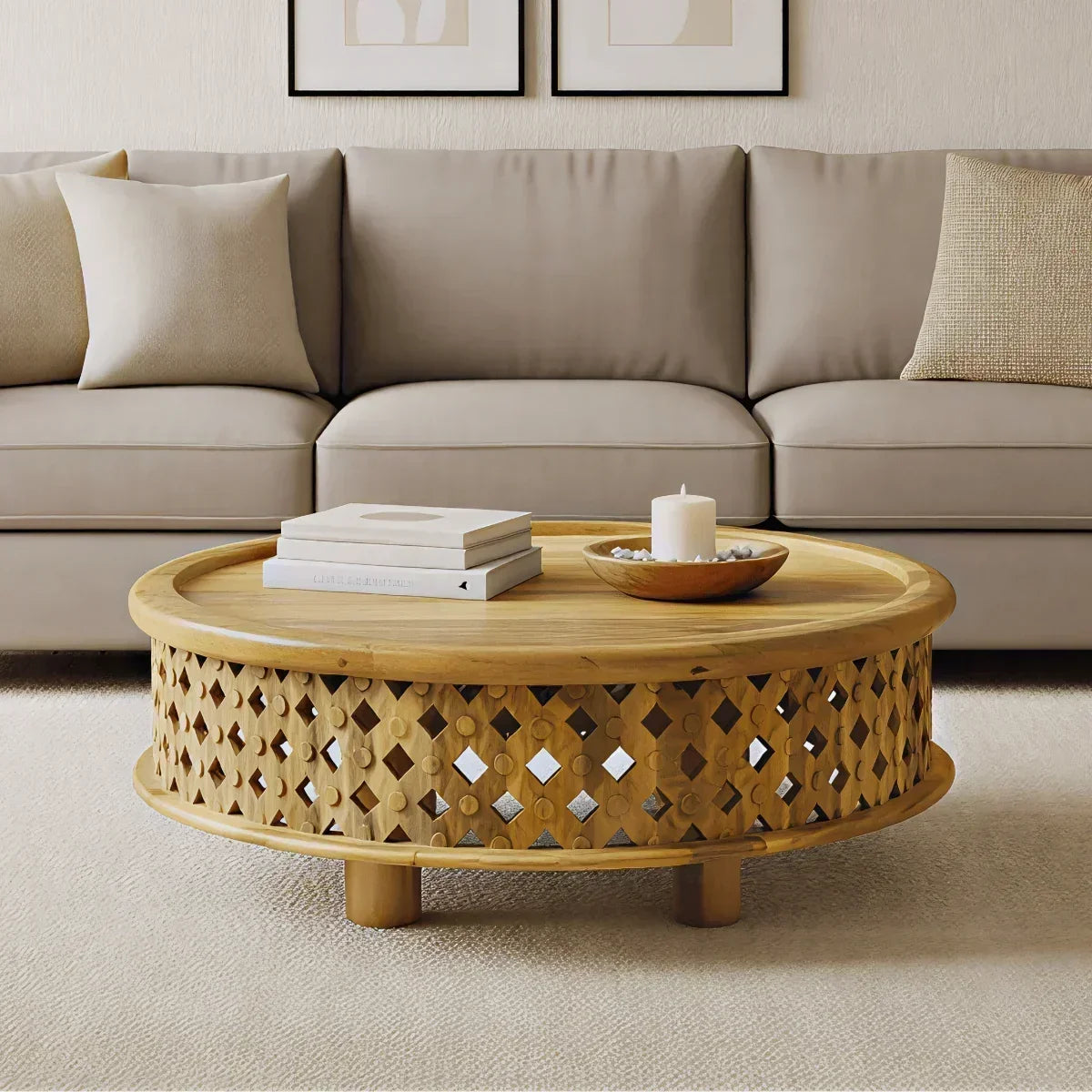 Oak & Loom Solid Wood Round Coffee Table Styled with Books, a Candle, and Decorative Tray in a Neutral Living Room.