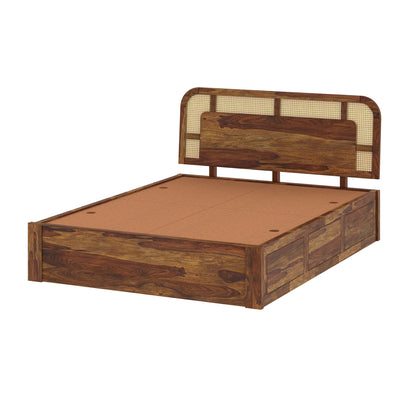 Wooden bed frame with a mesh headboard on a white background