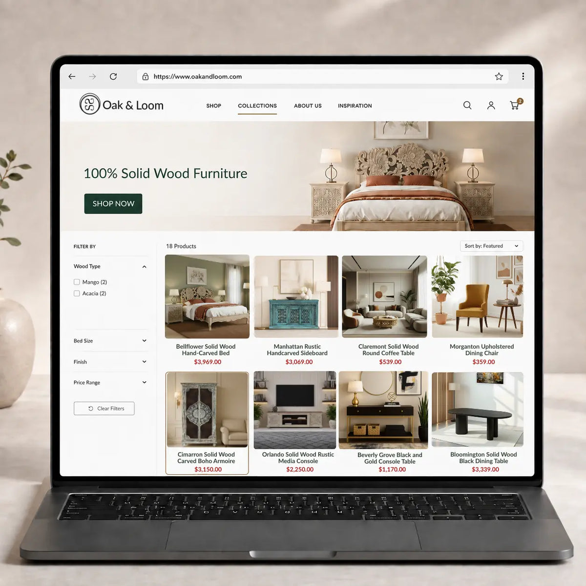 Laptop displaying the Oak & Loom furniture collection page with solid wood beds, dining chairs, coffee tables, sideboards, media consoles, and storage furniture.