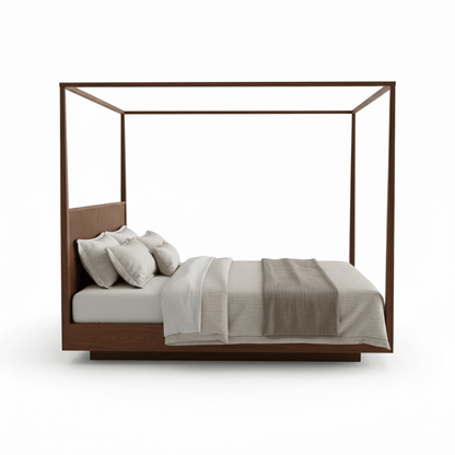 Wooden canopy bed with bedding on a white background