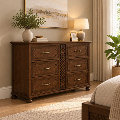 Winnetka carved wooden dresser styled in a bedroom with a table lamp, plant and framed art