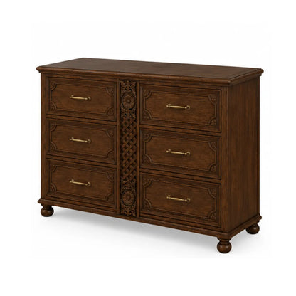 Angled view of Winnetka 6 drawer dresser showing brass bar pulls and turned bun feet